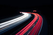  Traffic on the highway with red and white light trails in the dark. Traffic during rush hour on a street in Germany