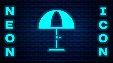 Wall Mural - Glowing neon Sun protective umbrella for beach icon isolated on brick wall background. Large parasol for outdoor space. Beach umbrella. Vector.