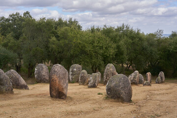 Cromlech of Almendres megalithic stone complex with cork trees in Alentejo, Portugal