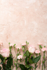 Wall Mural - Overhead view of pink flowers on light surface, roses