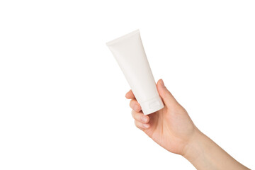 Cropped close up pov view photo of girl holding showing cream bottle with no label place for mock up isolated white background