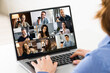 © Andrey Popov - Woman Video Chatting On Laptop