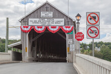 NEW  BRUNSWICK, CANADA - August 6, 2017: Entrance Of Of Hartland Covered  Bridge In New Brunswick. This 390-m (1,282-ft.) Bridge Opened On 1901, The Longest Wooden Covered Bridge In The World. 