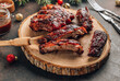 Homemade barbecued ribs seasoned with a spicy basting sauce. Christmas concept