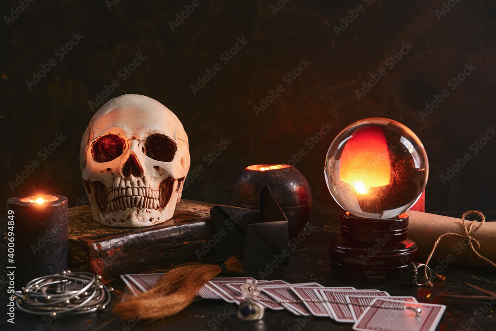 Accessories of fortune teller on table