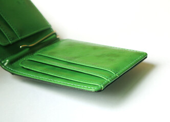 Blank green wallet isolated on white background . Open wallet . 