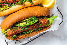 Vegan Carrot Hot Dog With Salad And Avocado. Alternative Fast Food. Healthy Food Concept.