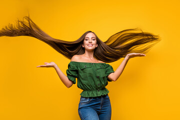 Poster - Portrait of lovely slim cheerful long-haired girl air blowing hairstyle having fun keratin therapy isolated on bright yellow color background