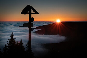 Wall Mural - Sunset over the clouds