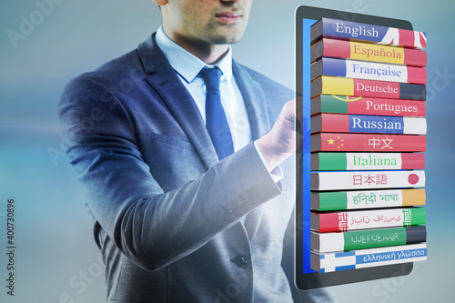 Online language learning with businessman Fotobehang