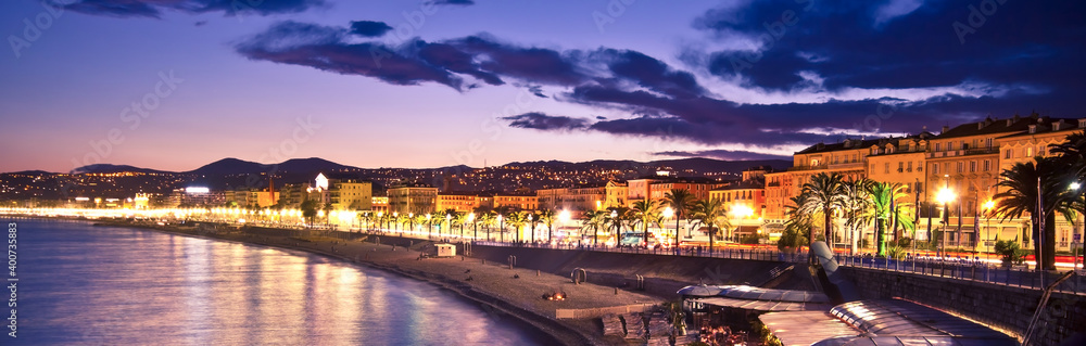 The beach and the waterfront of Nice at night, France. - obrazy, fototapety, plakaty 