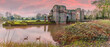 A panorama view of the sunset at Kirby Muxloe, UK towards the ruins of a castle
