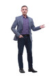 © ASDF - Casual portrait of young businessman, standing with hands in pocket