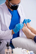 © Elnur - Podiatrist treating feet during procedure