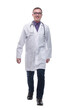 © ASDF - Full length portrait of young caucasian with stethoscope walking doctor