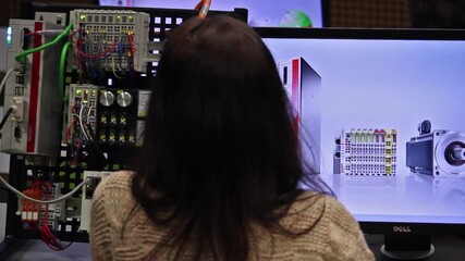 girl programming on embedded system