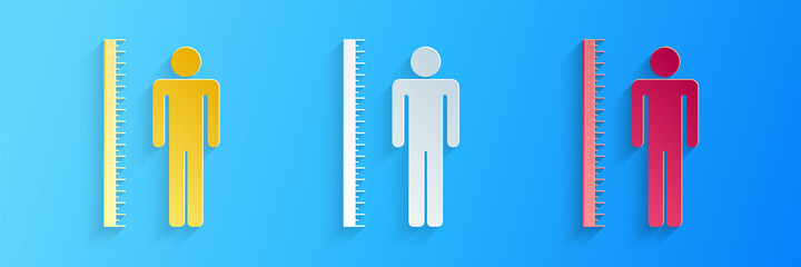 Paper cut Measuring height body icon isolated on blue background. Paper art style. Vector.