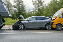 Damaged Cars On The Highway At The Scene Of An Accident