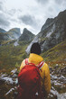 © EVERST - Man hiking solo enjoying mountains landscape travel in Norway outdoor adventure active healthy lifestyle weekend journey