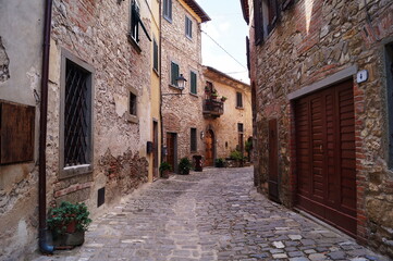 Wall Mural - Typical street in the ancient medieval village of Montefioralle, Tuscany, Italy