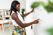 © Giorgio Fochesato/Westend61 - Businesswoman working on business plan while standing by whiteboard at office