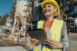 © Mareen Fischinger/Westend61 - Woman supervisor using digital tablet while standing at construction site