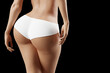 © PixlMakr - Woman showing perfect buttocks in white panties