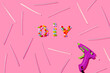 © gemma ferrando & jeremie roman/Westend61 - DIY text arranged with colorful pom poms and glue gun on pink background in studio