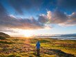 © Albrecht Wei√üer/Westend61 - Male hiker admiring sunset over Snaefellsnes peninsula, Iceland