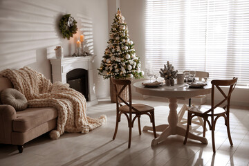 Wall Mural - Festive table setting and beautiful Christmas decor in living room. Interior design