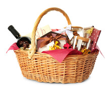 Wicker Basket Full Of Gifts Isolated On White
