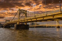 Sunset View Of Downtown Bridges And The Allegheny River In Pittsburgh, Pennsylvania.