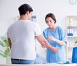 © Elnur - Man visiting female doctor in medical concept