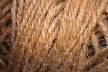 Natural rope twine textured background close up plan. Fibers in a mess rustic style