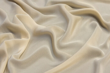 The texture of fabric beige color. Background, pattern.