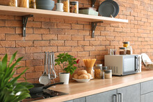 Interior Of Modern Kitchen With Shelves