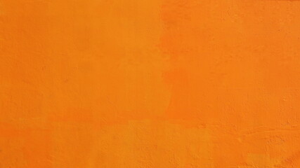 Wall Mural - Bright orange cement wall. Vintage orange painted texture or background wall for full frame wallpaper background. Selective focus