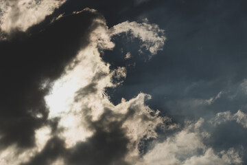 black stormy clouds in the blue sky