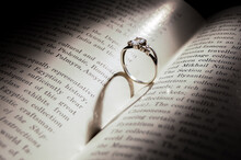 The Ring In The Book Casts A Shadow In The Form Of A Heart