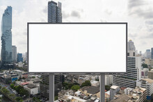 Blank White Road Billboard With Bangkok Cityscape Background At Day Time. Street Advertising Poster, Mock Up, 3D Rendering. Front View. The Concept Of Marketing Communication To Promote Or Sell Idea.