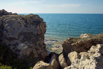 Huge stones among the rocks by the sea.