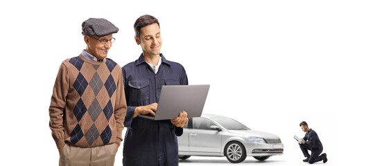 Wall Mural - Elderly customer with a silver car and a mechanic with a laptop computer for vehicle check