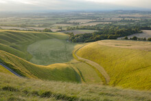 Curved Grasslands Seen From Above At Sunset From White Horse Hill Uffington 