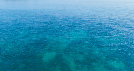 Wall Mural - sea blue water surface texture background, aerial view, vacation travel concept