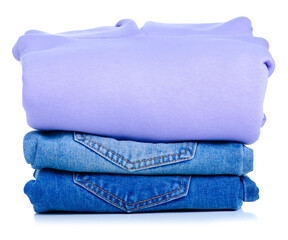 Poster - Stack folded jeans with sweater hoodie on white background isolation