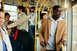 Young African American man commuting by public transport.
