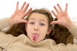 © lotosfoto - Girl showing tongue and gesturing