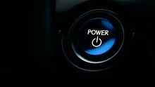 Pushing Blue Power Ignition Button To Start Keyless Ignition Hybrid Car Engine