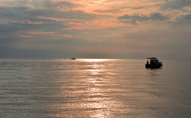 Wall Mural - boat at sunset