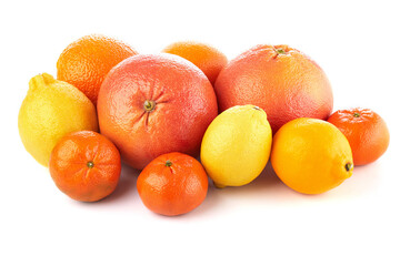 Wall Mural - Fruit composition. Group of citrus: orange, lemon, mandarine tangerine, grapefruit. full, half and slices on white background, macro close-up